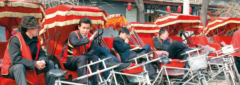Rikscha Fahrer in Peking